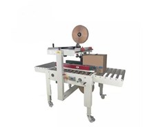 Máy dán băng keo thùng FXJ5050