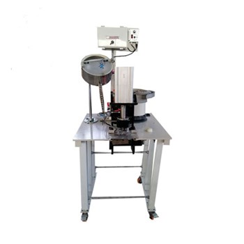 Máy dập khuy bạt viền đen tự động