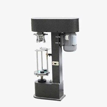 Máy đóng nắp chai loại có nắp chụp nhựa DK-50Z