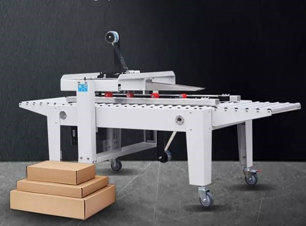 may dan bang keo thung carton ban tu dong hai dong co hualian fxj-2550x hinh 0