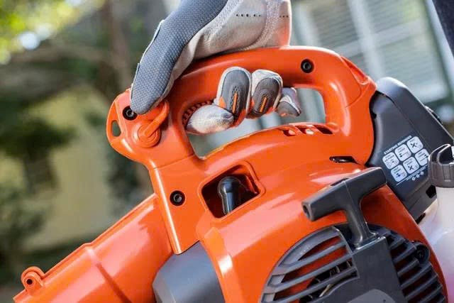 may thoi la husqvarna 570bts hinh 1
