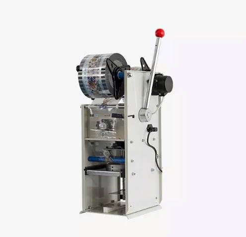máy dán miệng cốc sữa chua/trà sữa (có trân châu) bán tự động hl-95b hình 1 may dan mieng coc sua chua/tra sua (co tran chau) ban tu dong hl-95b hinh 1